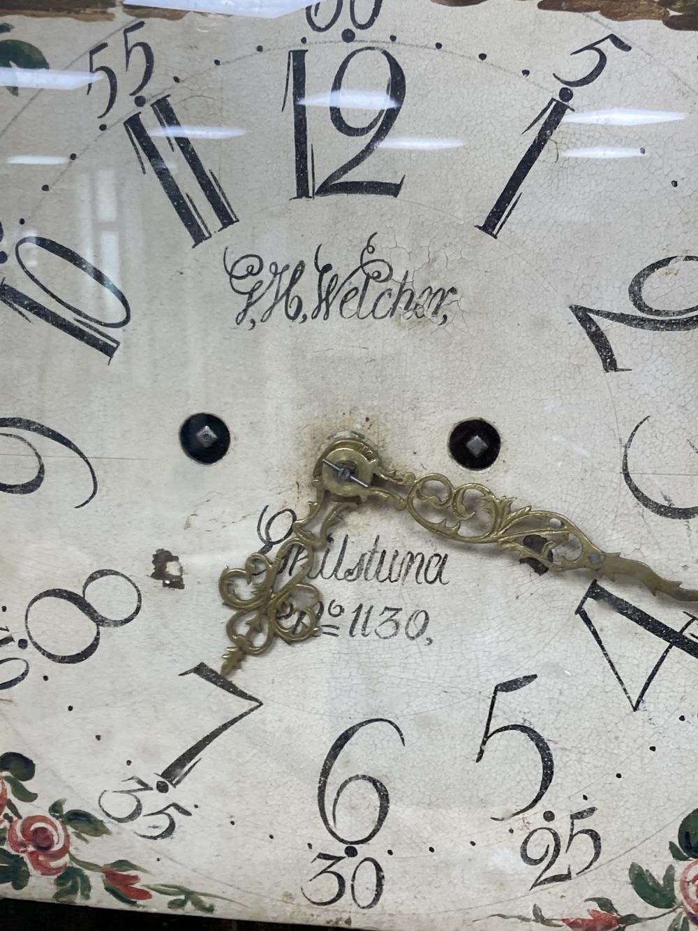 A Swedish pine longcase clock, G H Welcher, Eskilstuna, with painted dial, height 216cm